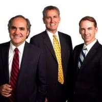 Torgan Cooper & Aaron logo