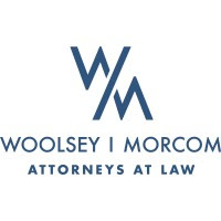 Woolsey Morcom Attorneys at Law logo